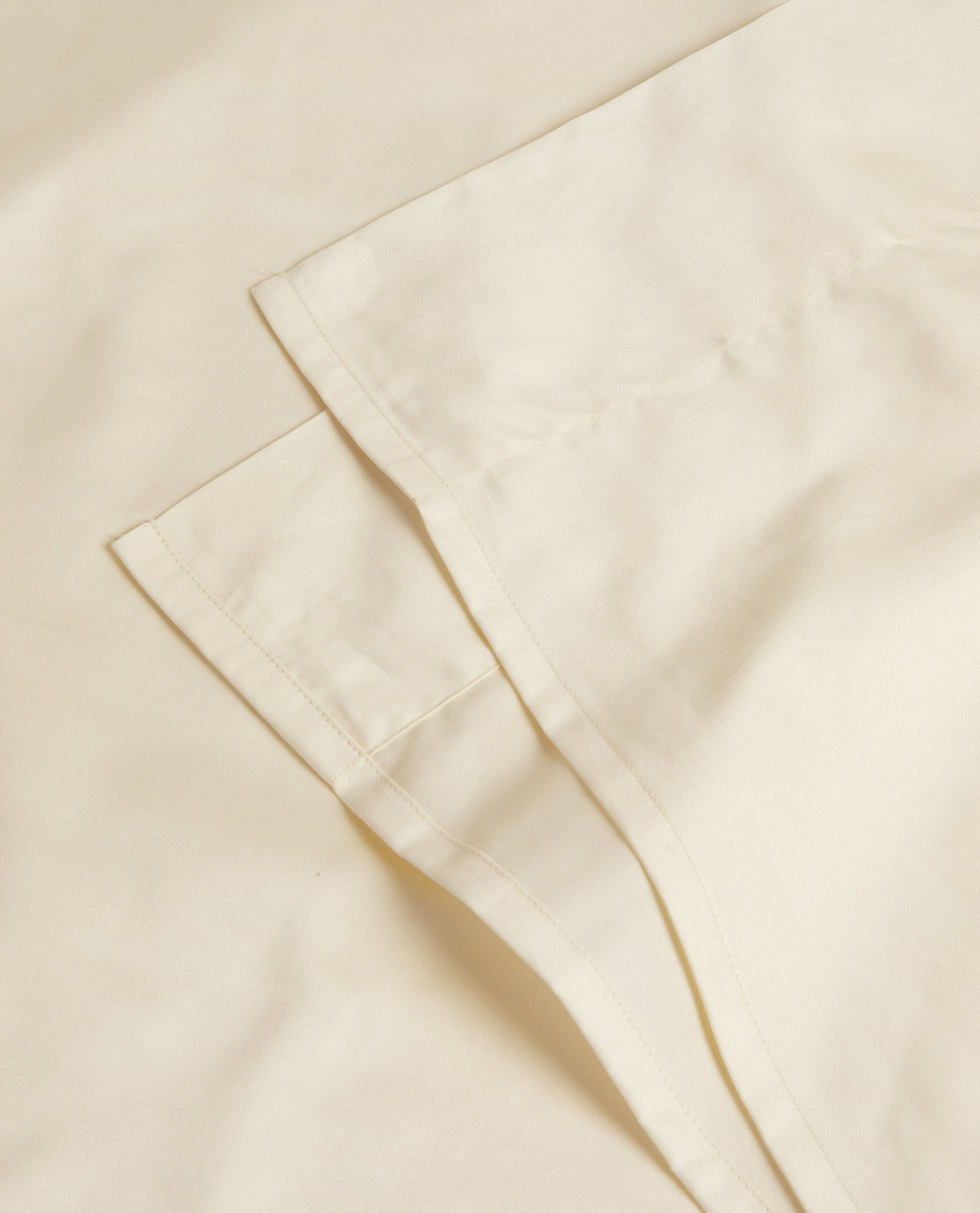 Image 2 of 3 showing Rise & Fall's Soft & Smooth sateen cotton flat sheet in buttermilk.