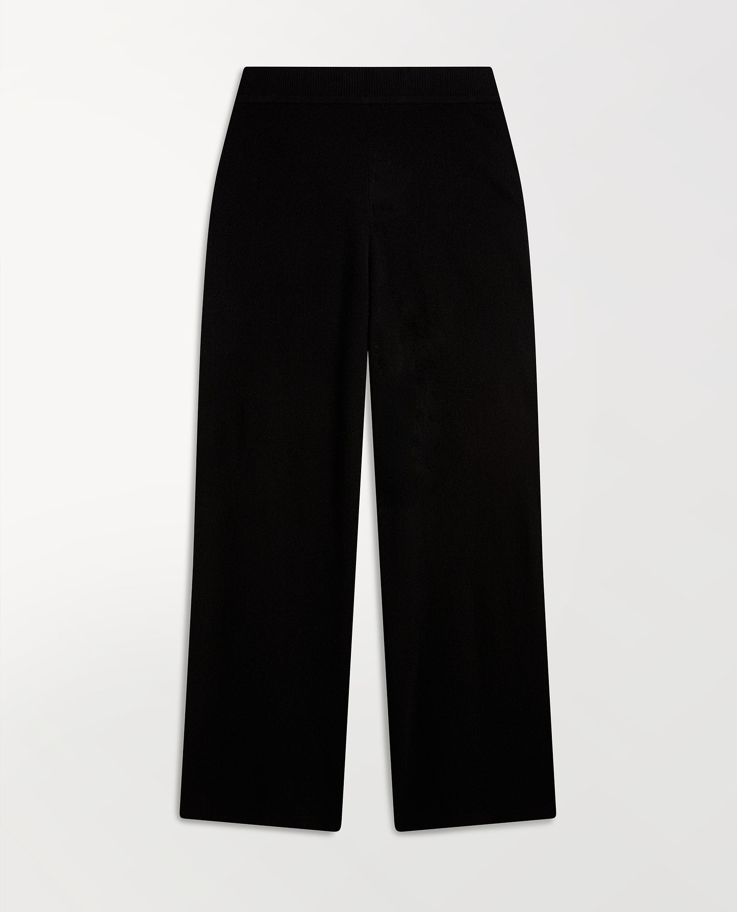 Image 2 of 4 showing Rise & Fall's black fine cashmere wide-leg trousers.