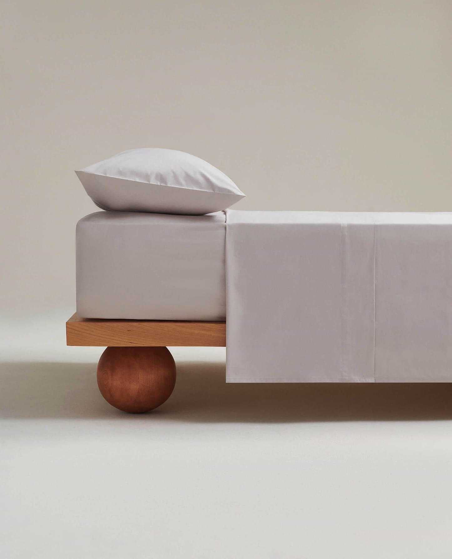 Image 2 of 4 showing Rise & Fall's Crisp & Cool organic cotton flat sheet in pebble.