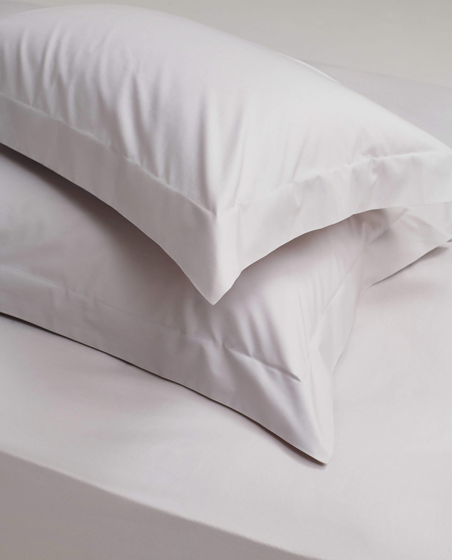 Image 2 of 5 showing Rise & Fall's Soft & Smooth Cotton Sateen Oxford Pillowcase Set in pebble.