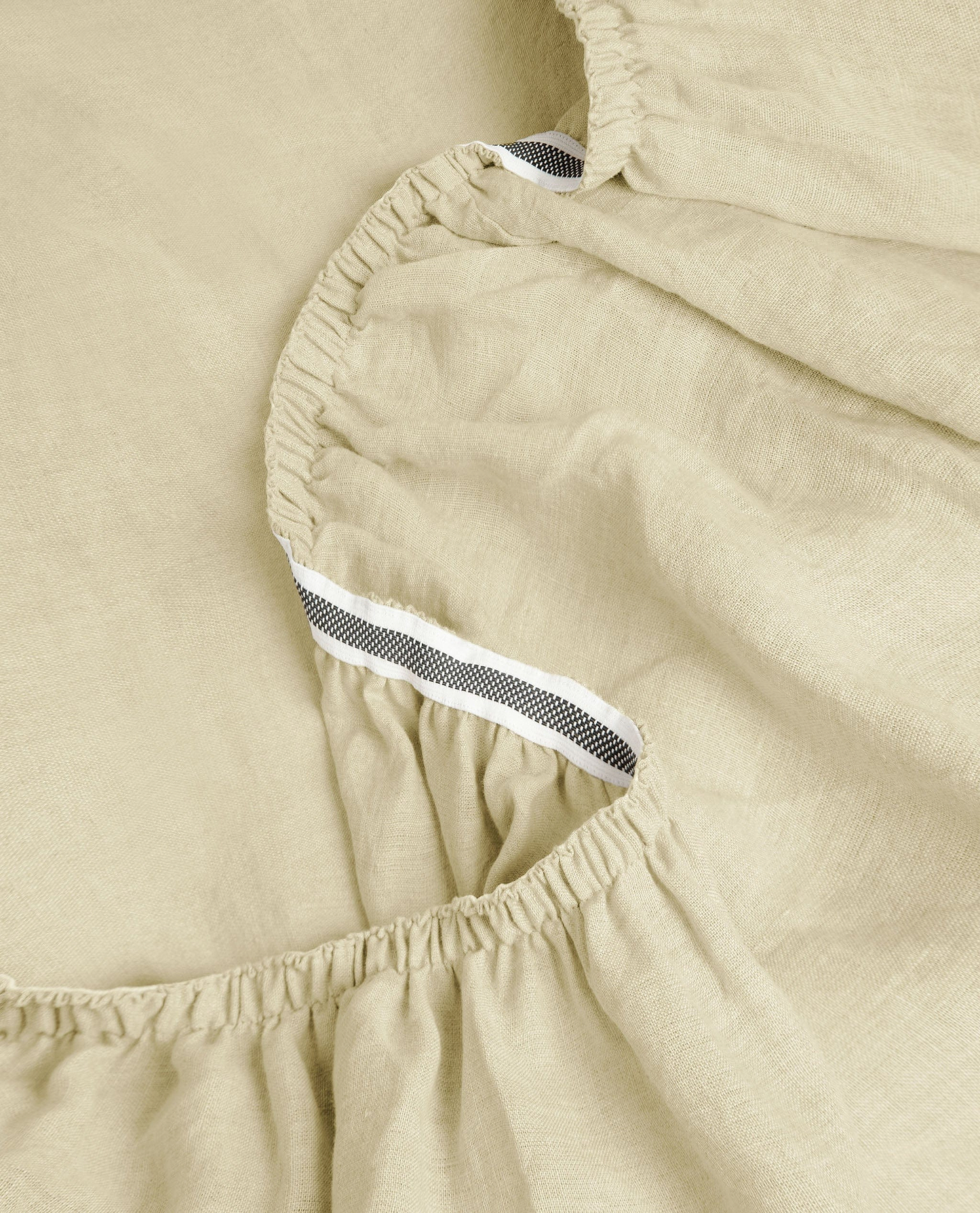 Image 2 of 6 showing Rise & Fall's House of Grey European Flax™ Linen Fitted Sheet in celery.