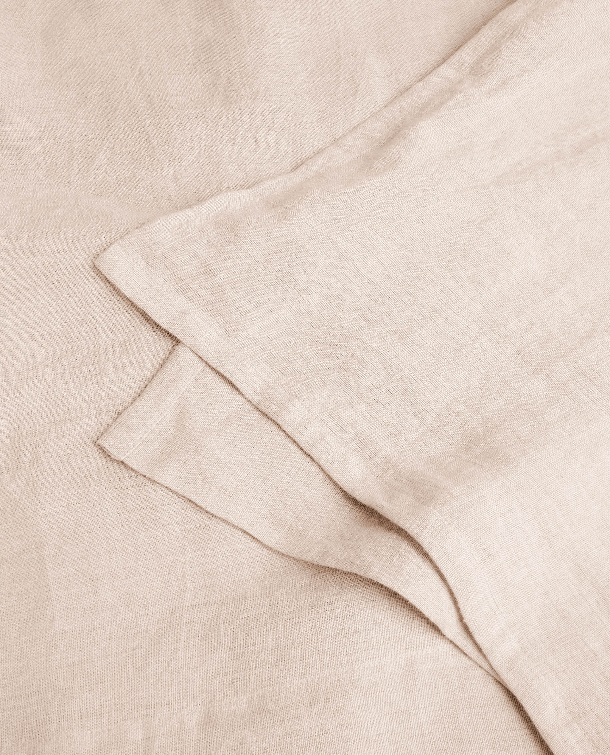 Image 2 of 6 showing Rise & Fall's House of Grey linen flat bed sheet in peach.
