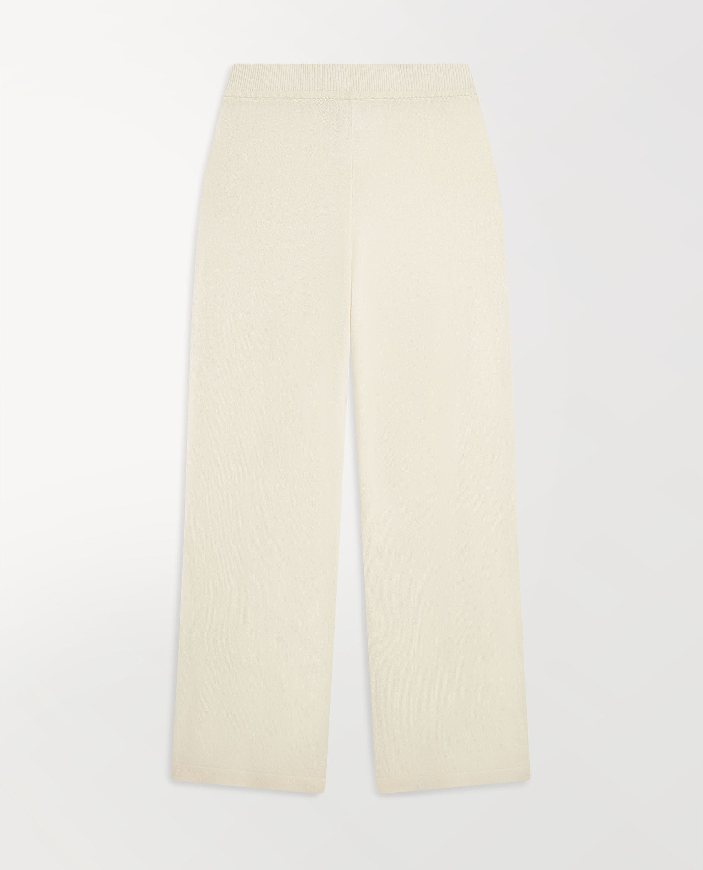 Image 2 of 6 showing Rise & Fall's cream fine cashmere wide-leg trousers.