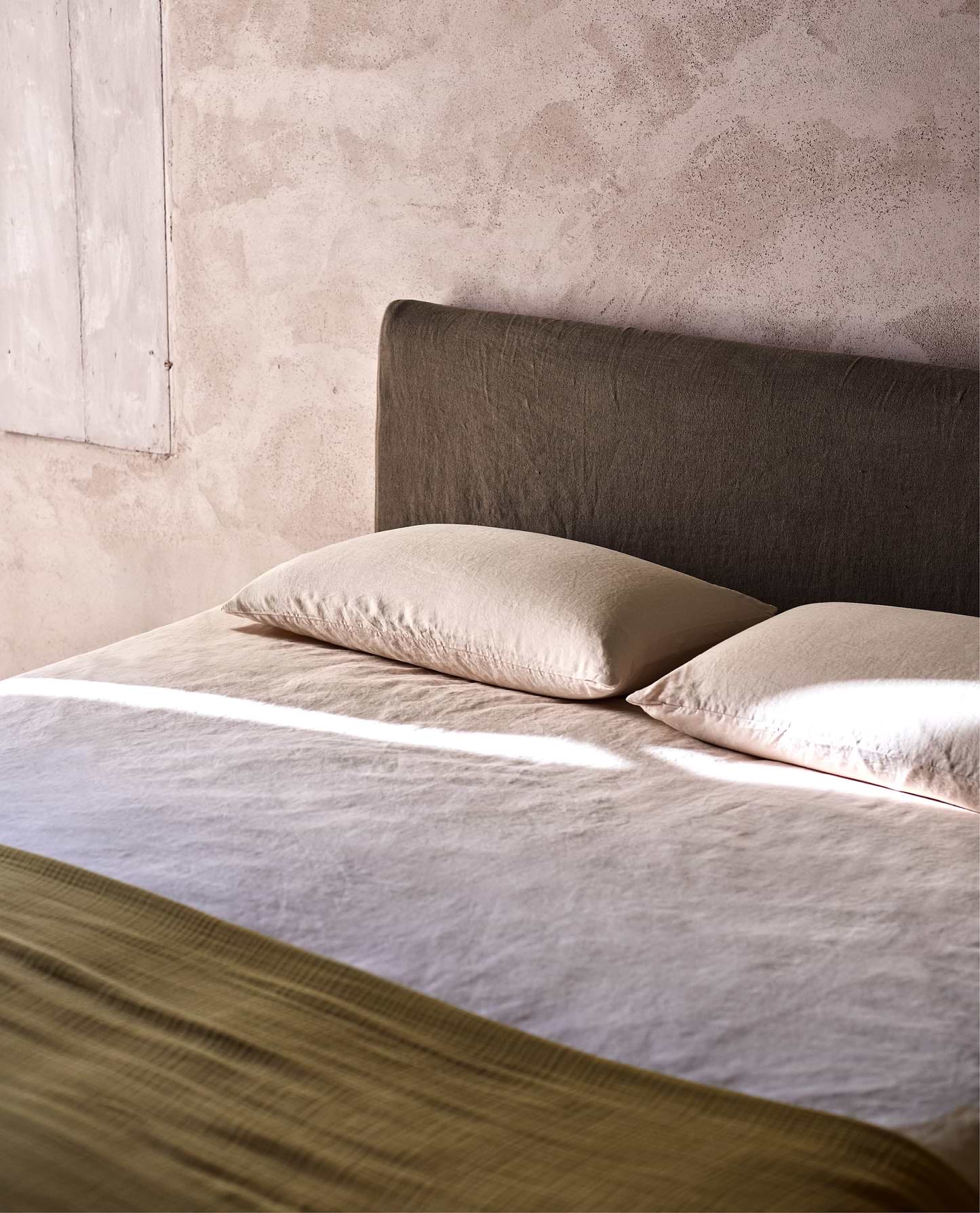 Image 3 of 6 showing Rise & Fall's House of Grey linen duvet set in peach.
