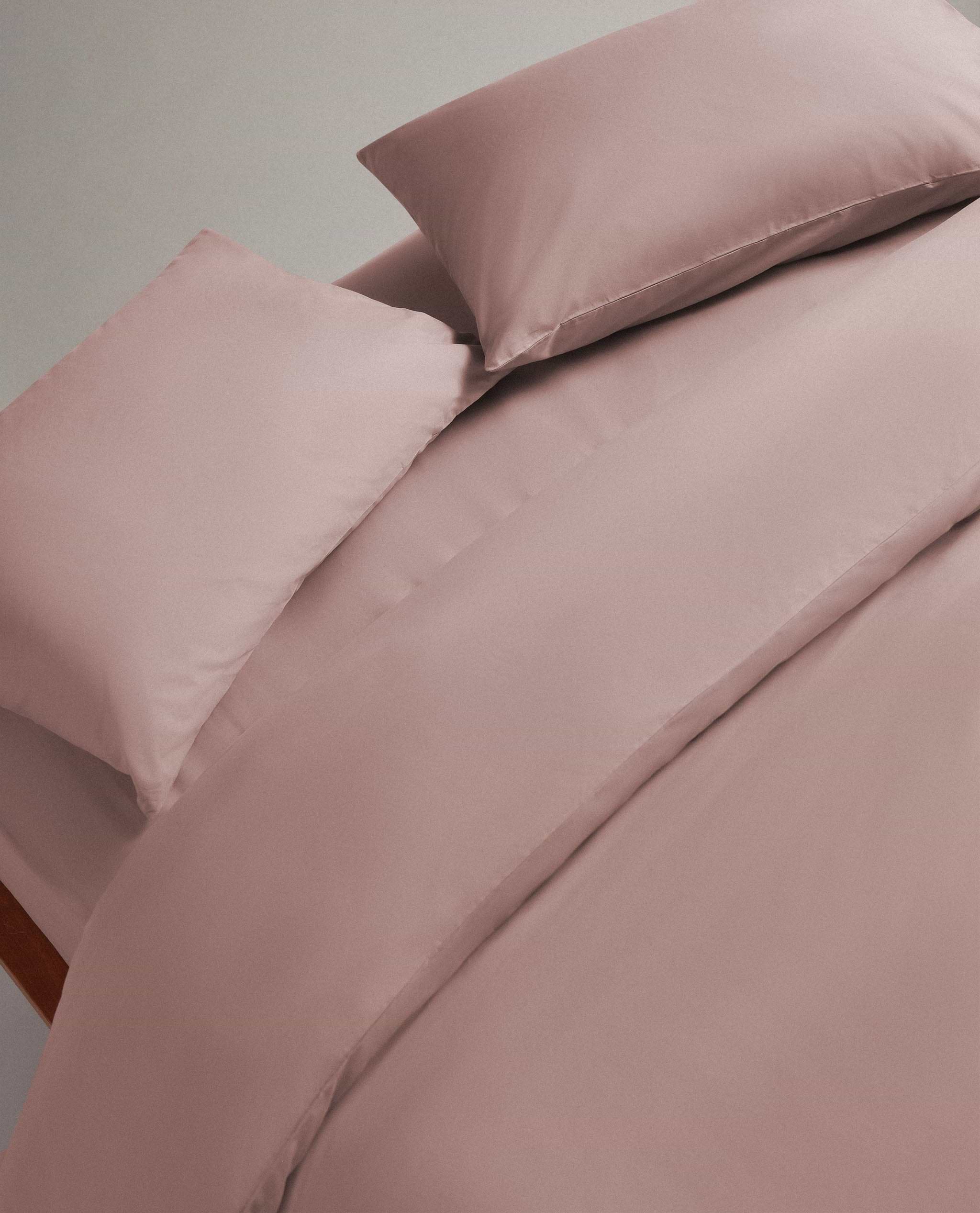 Image 4 of 6 showing bed made with Rise & Fall's Crisp & Cool organic cotton duvet set in clay.
