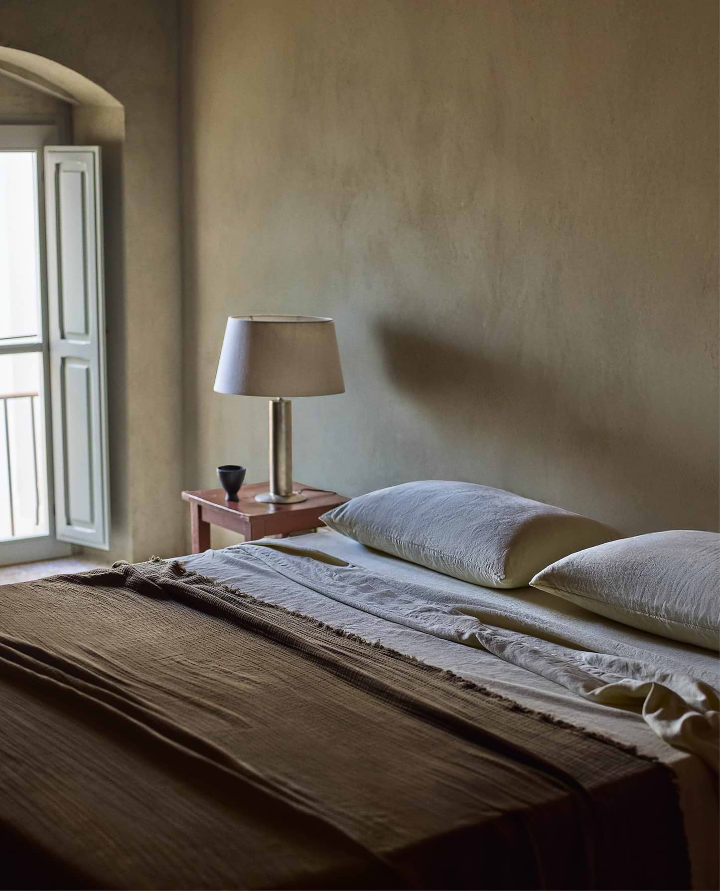 Image 4 of 6 showing Rise & Fall's Relaxed & Refined linen duvet set in pale peach.