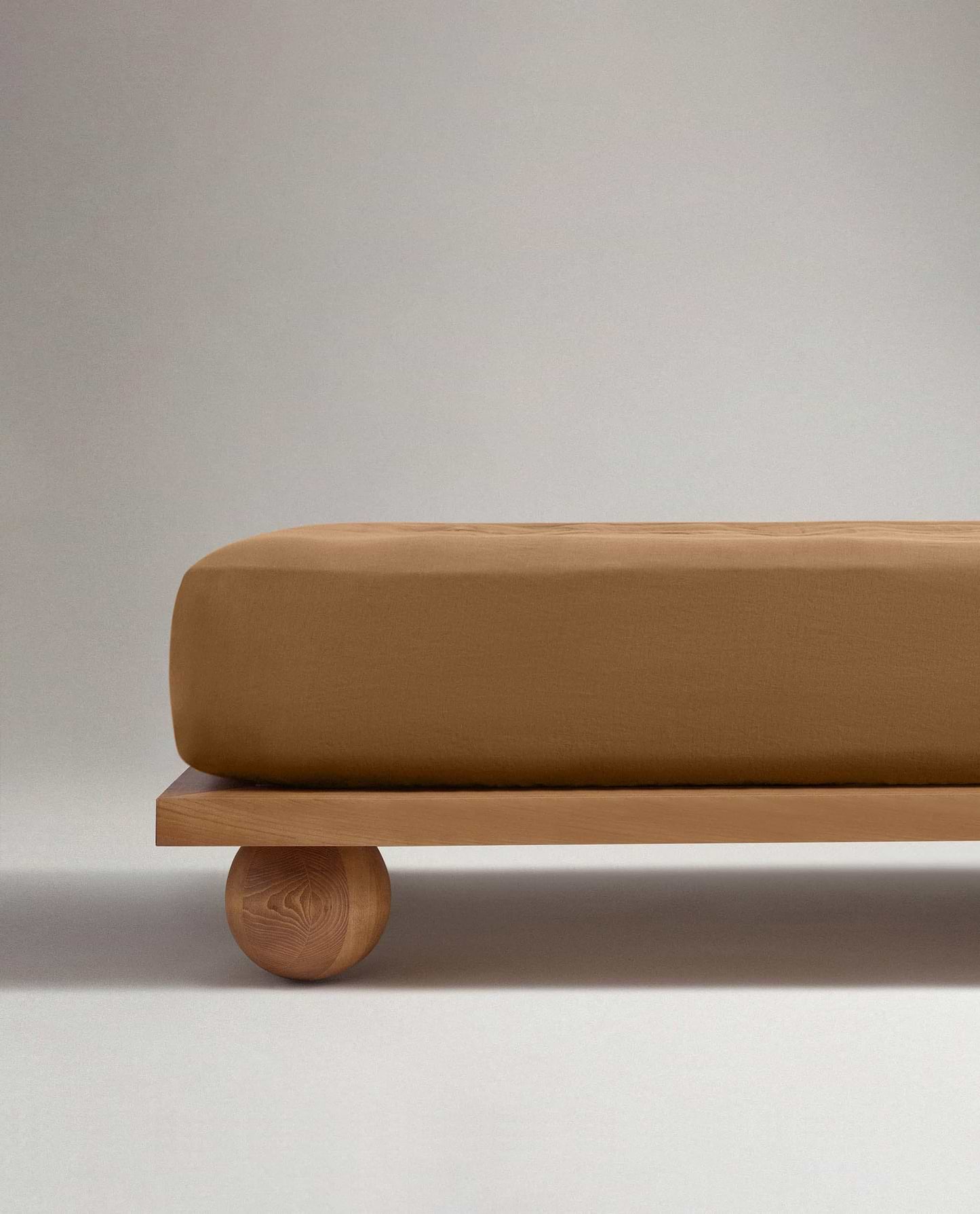 Image 5 of 5 showing Rise & Fall's Relaxed & Refined European flax™ linen fitted sheet in ochre.
