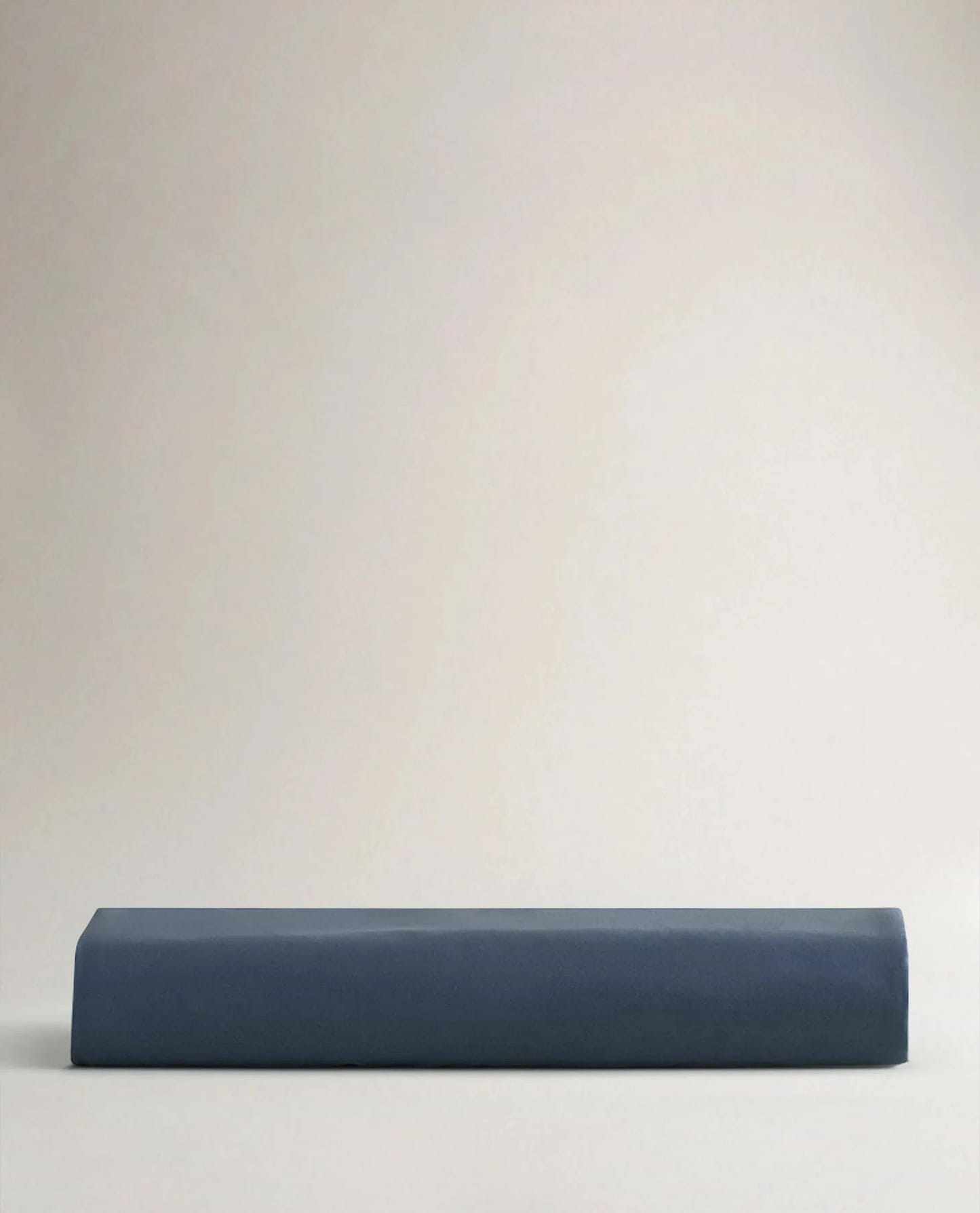 Image 5 of 6 showing Rise & Fall's Crisp & Cool organic cotton fitted sheet in indigo.