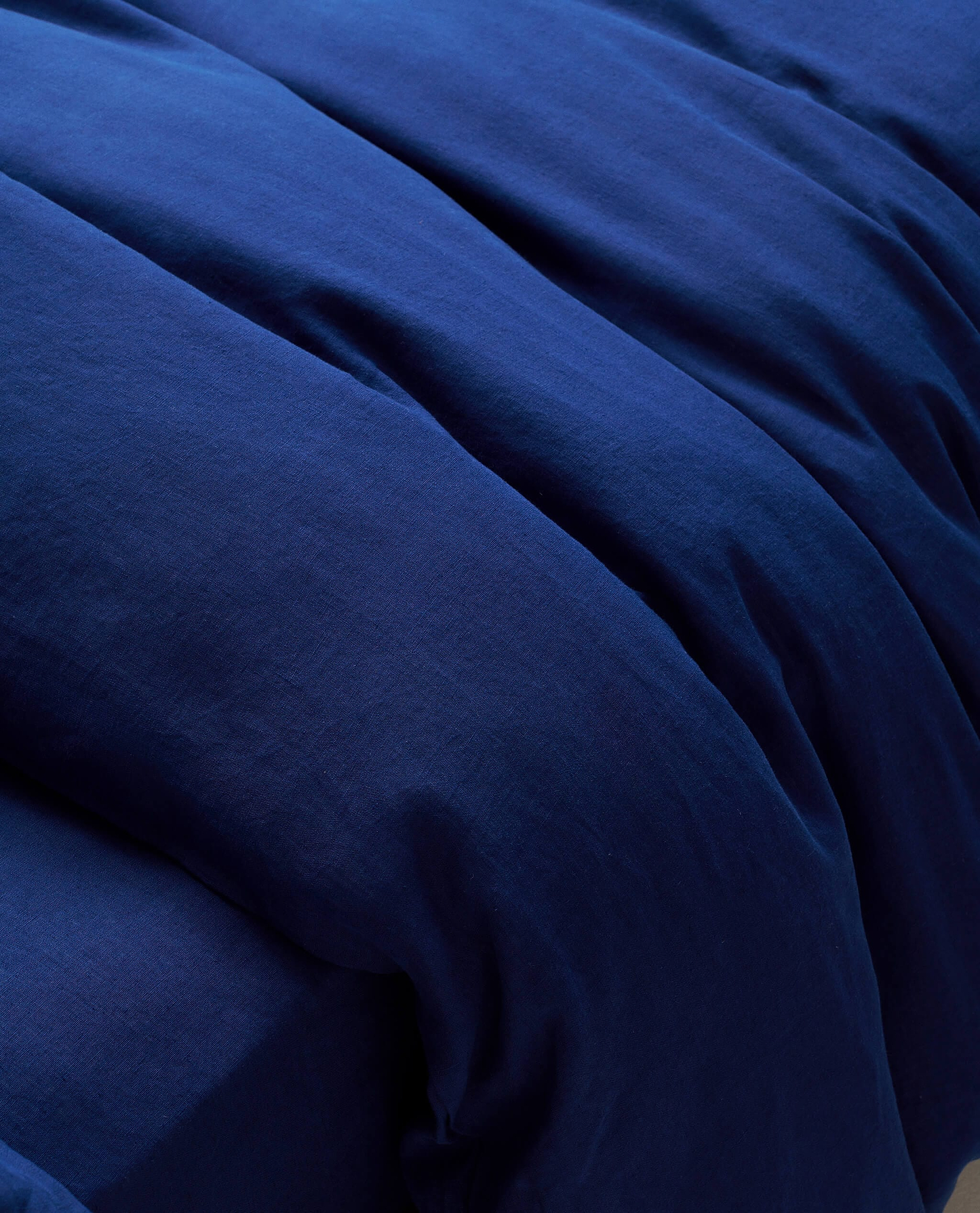 image 6 of 6 showing close up of Rise & Fall's Relaxed & Refined linen duvet set, fabric: European flax, colour: indigo