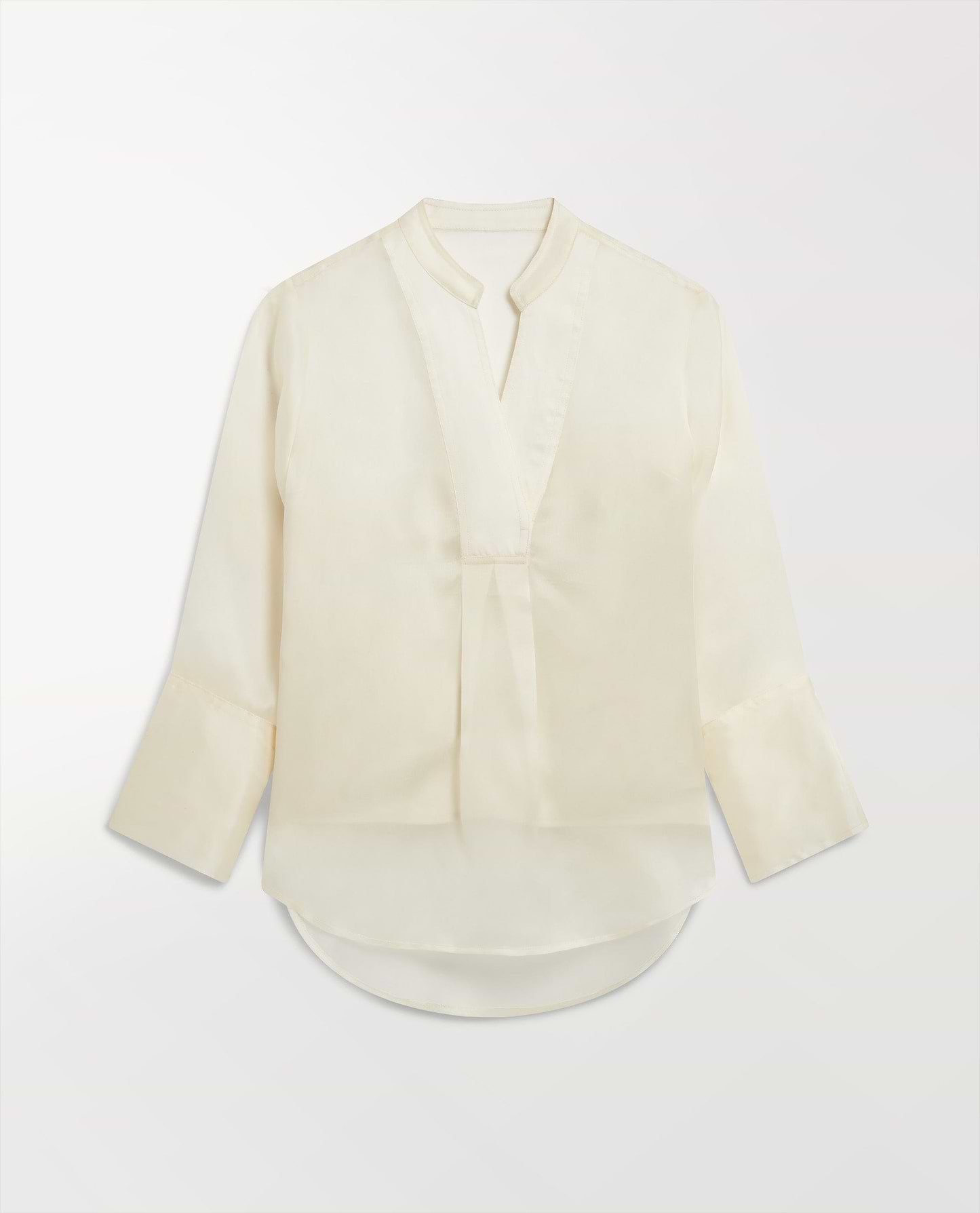 Woman's silk organza tunic blouse in shell.
