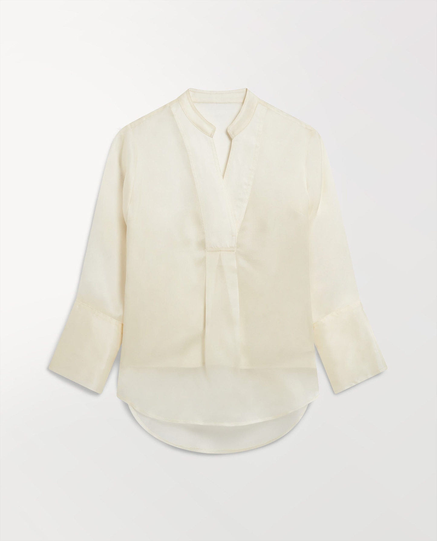 Woman's silk organza tunic blouse in shell.