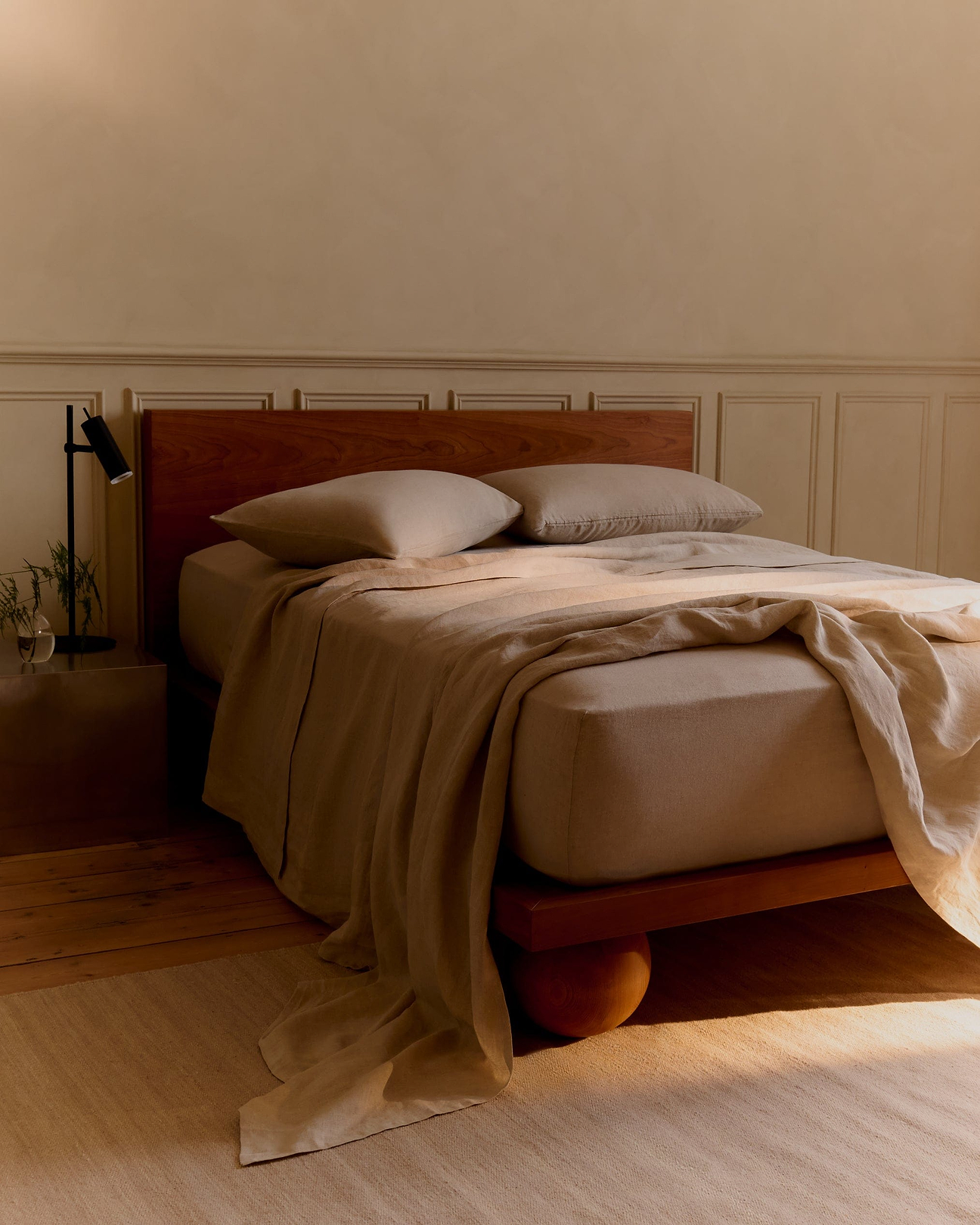 A bed made with Rise & Fall's Clay Cotton Bedding Set.