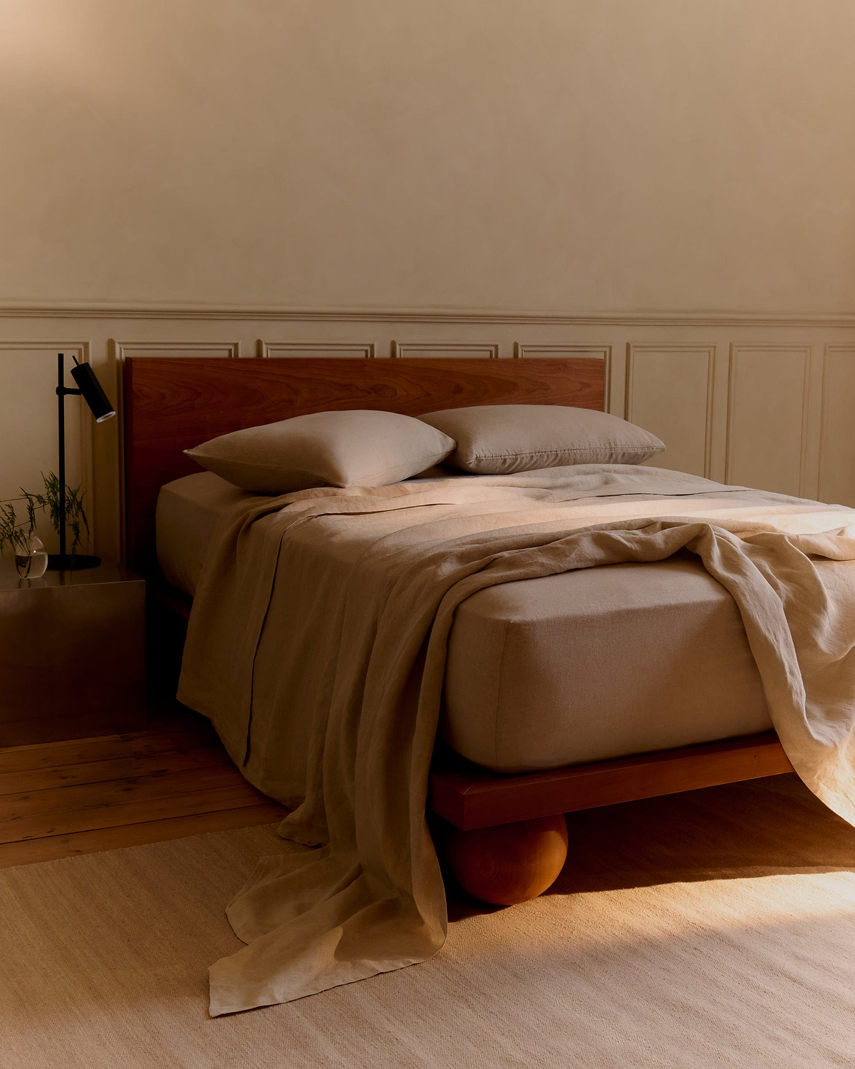 A bed made with Rise & Fall's Clay Cotton Bedding Set.
