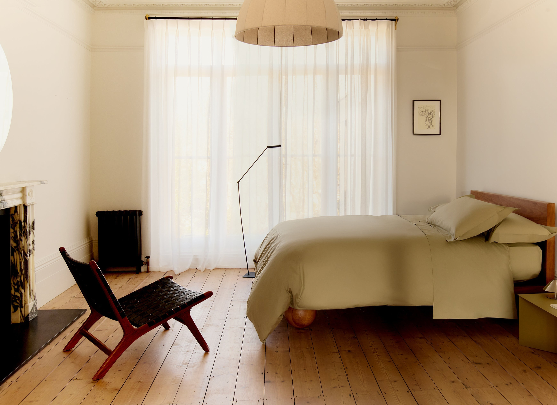A tranquail bedroom with organic cotton bedding.