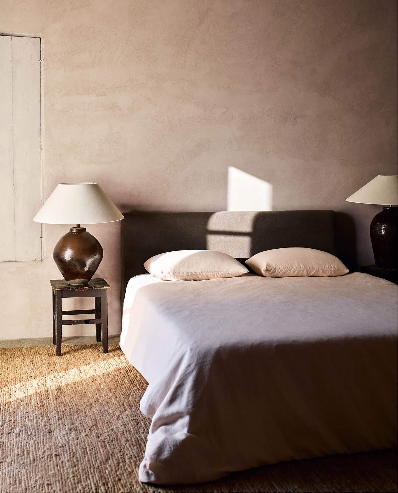 A dimly lit bedroom. 