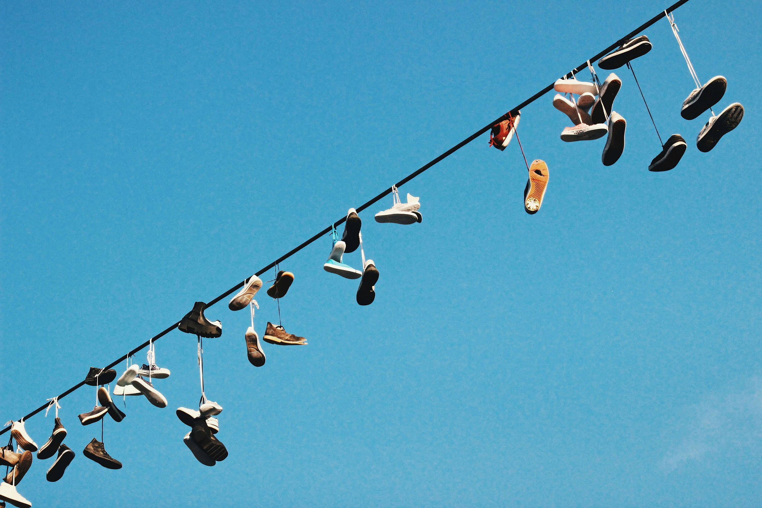 Shoes Hanging From A Rope.