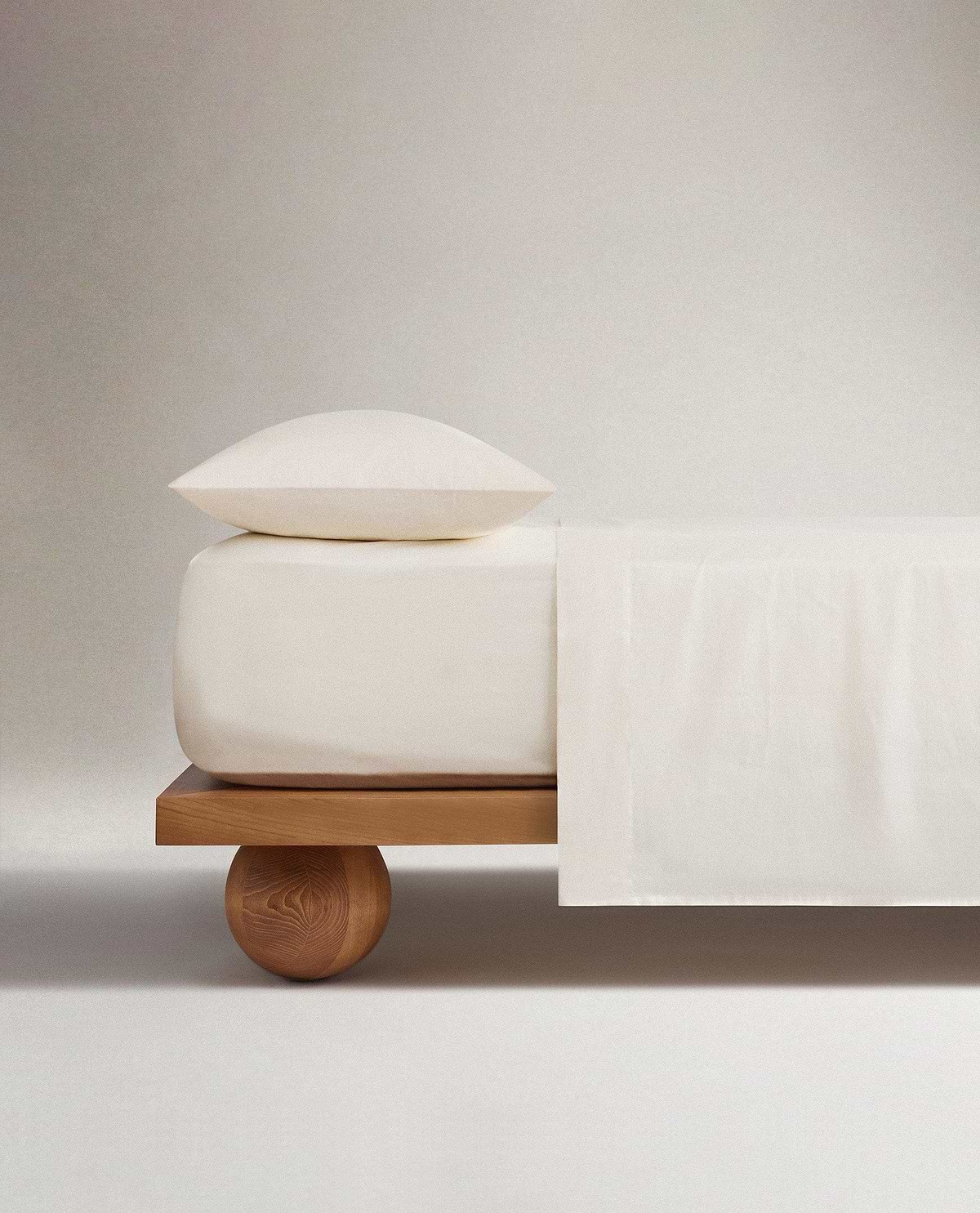 Image 1 of 3 showing Rise & Fall's Crisp & Cool organic percale cotton flat sheet in buttermilk.