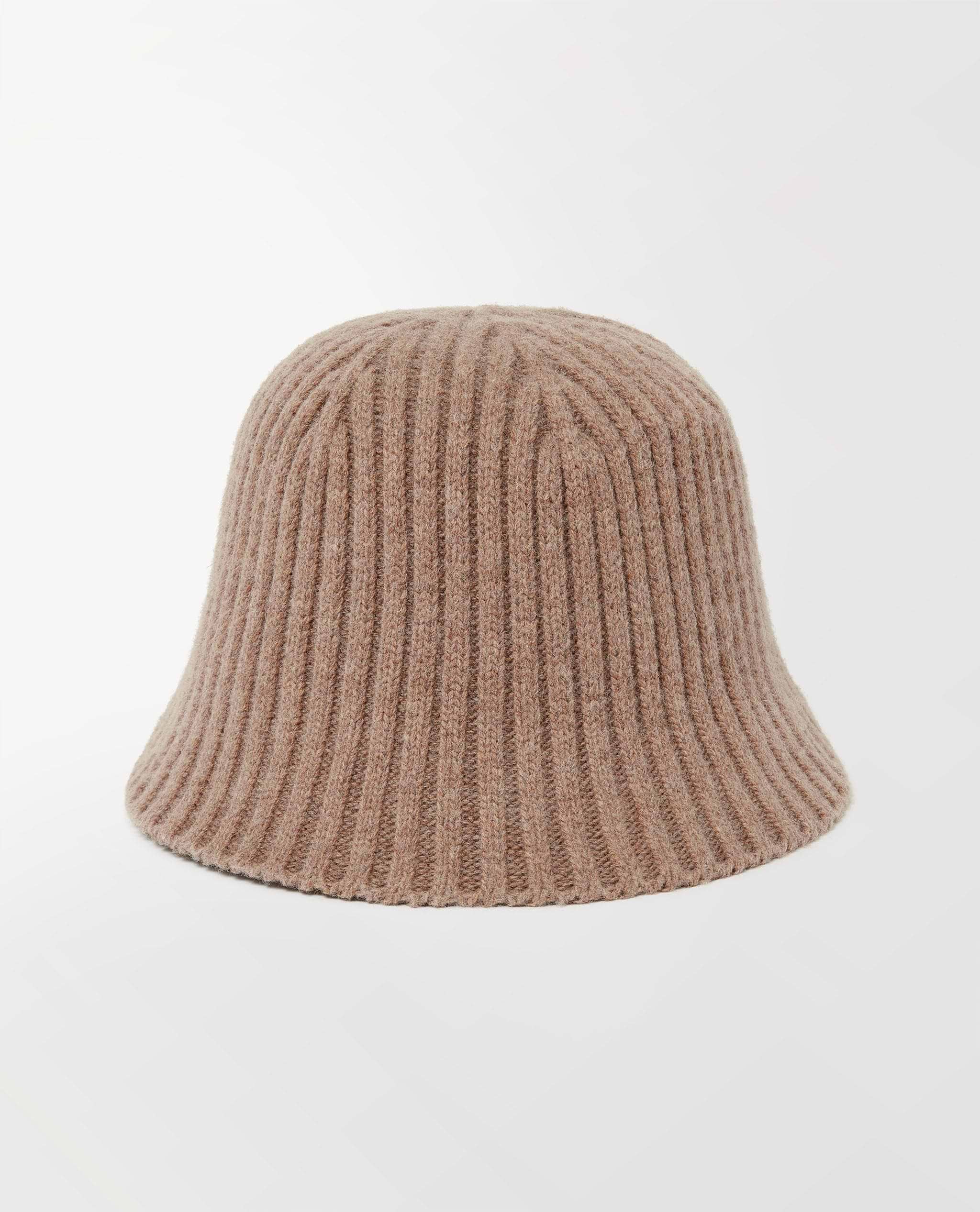 Close up of Rise & Fall's beige merino wool ribbed knit bucket hat.