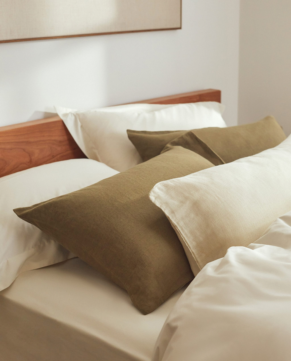 Cream Cotton Duvet Set With Olive Linen Pillows. 