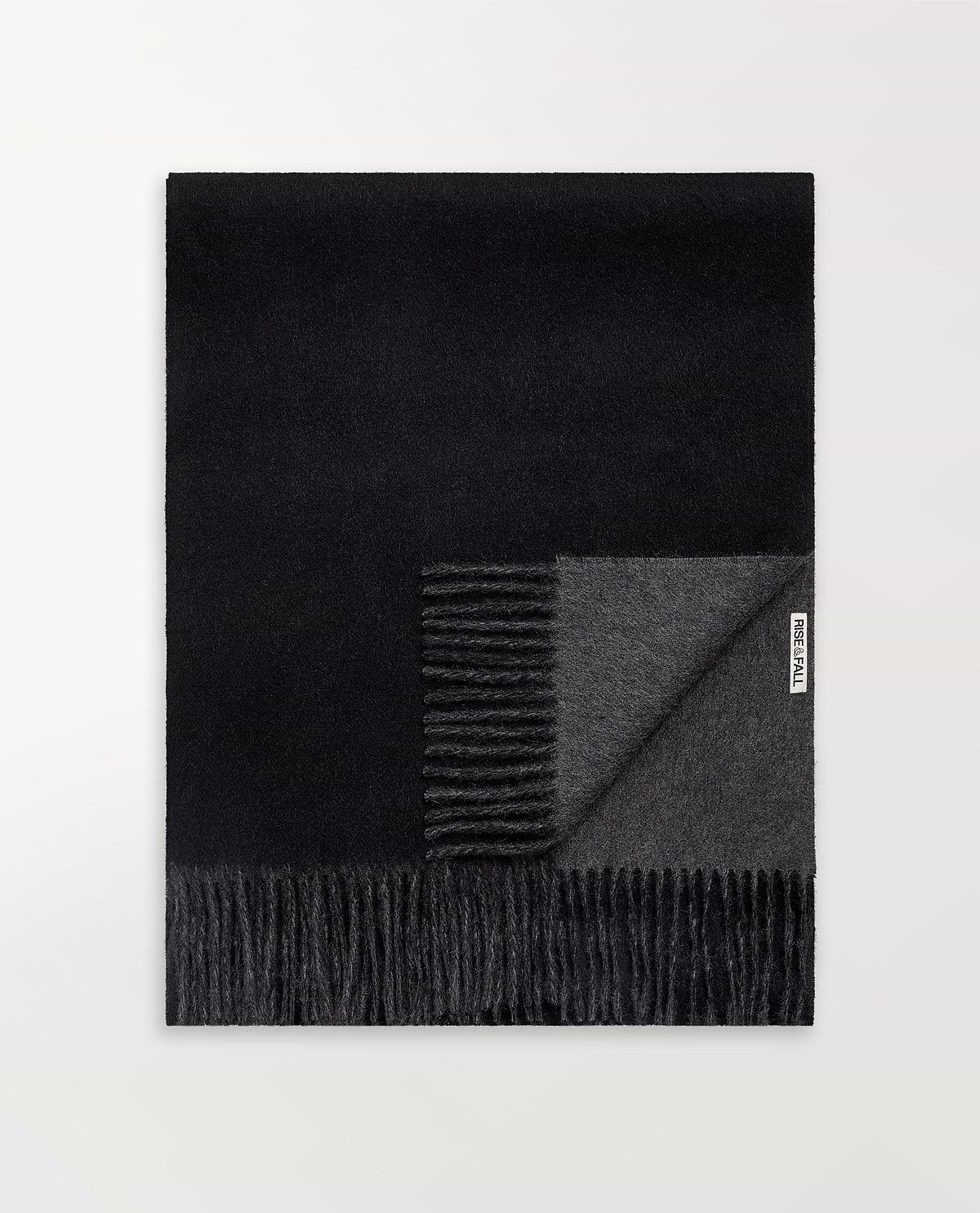 Image 1 of 2 showing Rise & Fall's finest cashmere double faced wrap, colour: black and charcoal.