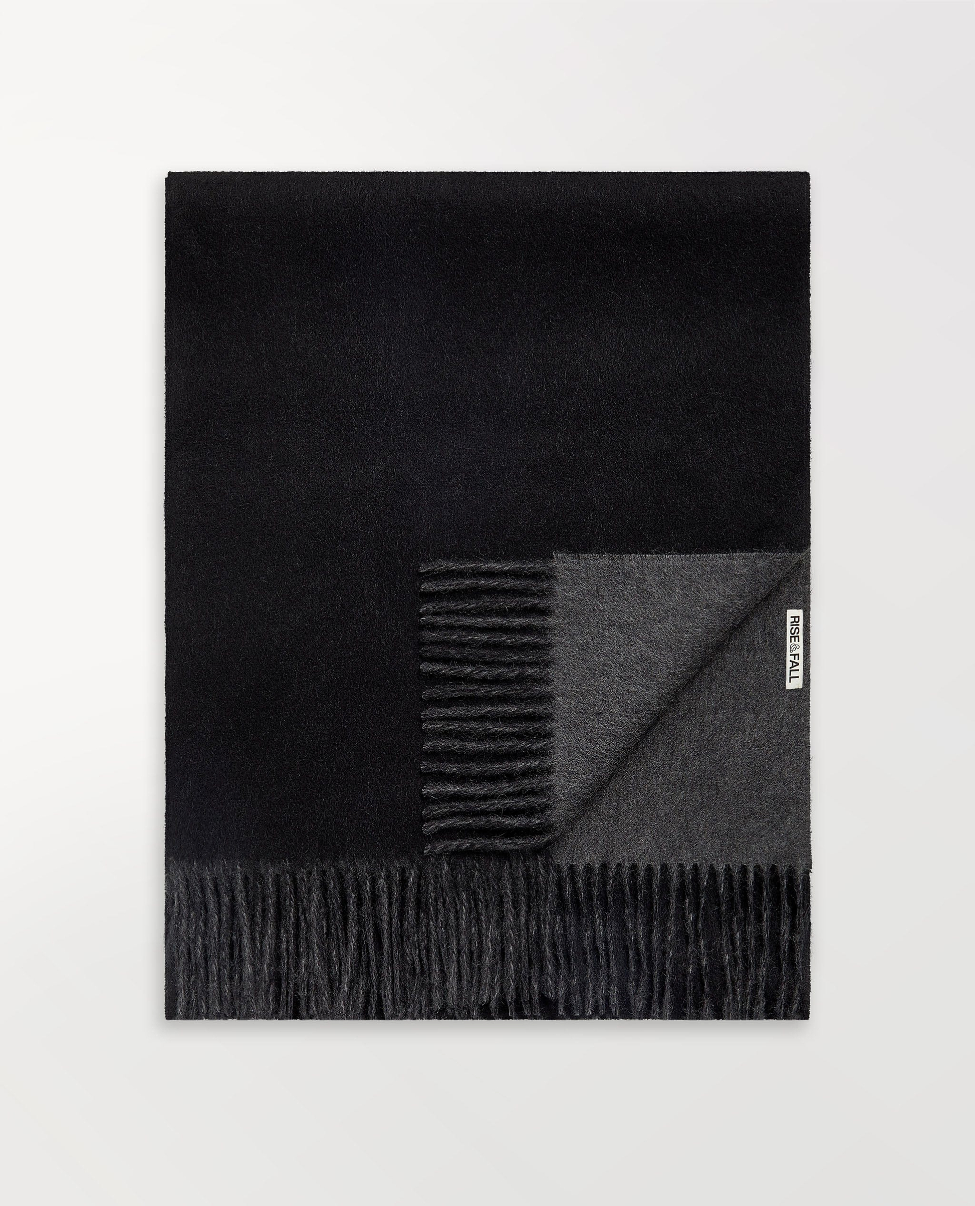 Image 1 of 2 showing Rise & Fall's finest cashmere double faced wrap, colour: black and charcoal.