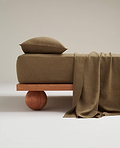 Image 1 of 3 showing Rise & Fall's Relaxed & Refined linen flat bed sheet in olive.