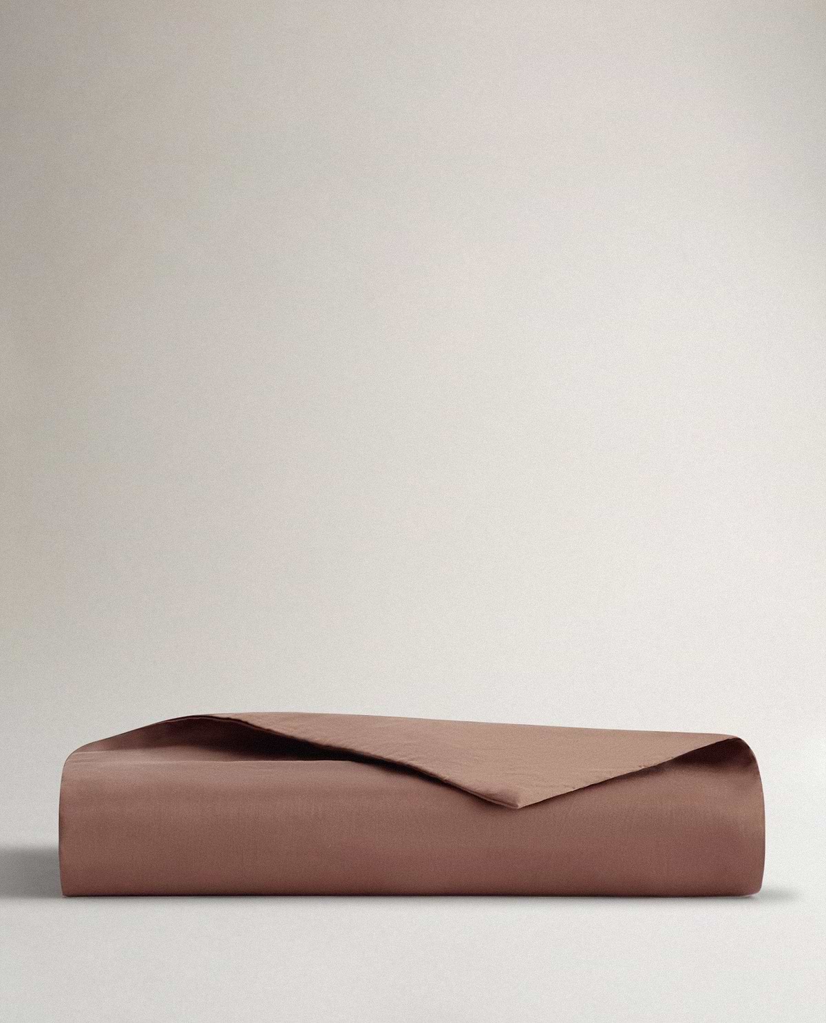 Image 1 of 3 showing Rise & Fall's sateen cotton duvet cover, colour: deep clay.