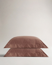 Image 1 of 3 showing Rise & Fall's Soft & Smooth Sateen Cotton Oxford Pillowcase set, colour: Deep Clay.