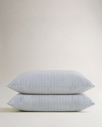 Image 1 of 4 showing Rise & Fall's Crisp & Cool Organic Cotton Pillowcase Set, colour: blue stripes.
