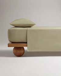 Image 1 of 4 showing Rise & Fall's Crisp & Cool organic percale cotton flat sheet in sage.