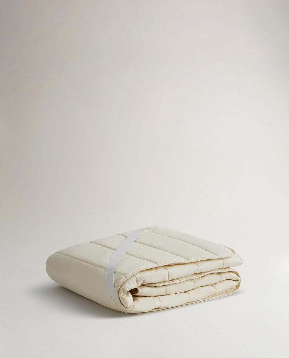 Image 1 of 5 showing Rise & Fall's certified British Wool Mattress Protector.