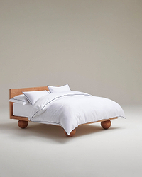 Image 1 of 5 showing Rise & Fall's percale cotton duvet cover, colour: white navy piping.