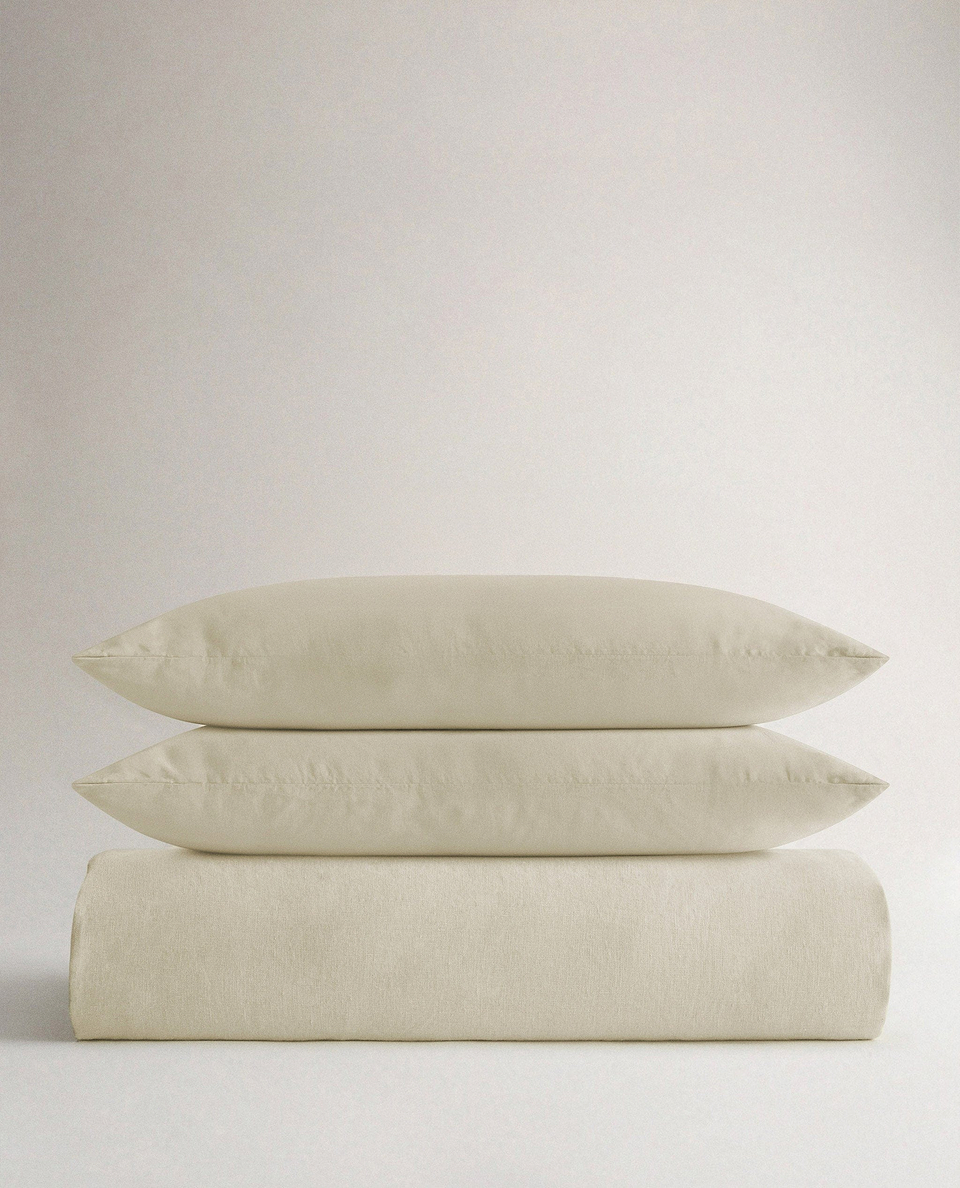 image 1 of 5 showing Rise & Fall's Relaxed & Refined linen duvet set, fabric: European flax, colour: celery