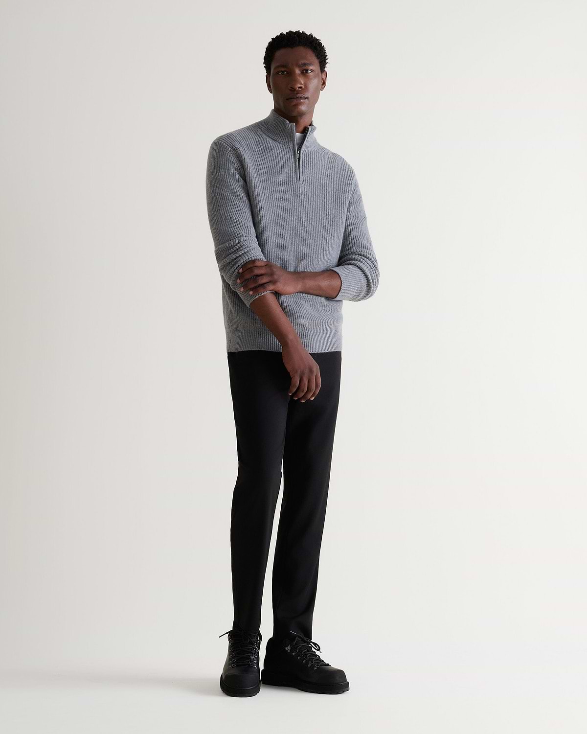 Image 1 of 6 showing man wearing Rise & Fall's Cashmere Merino Fishermans Rib 1/4 Zip Jumper in grey.