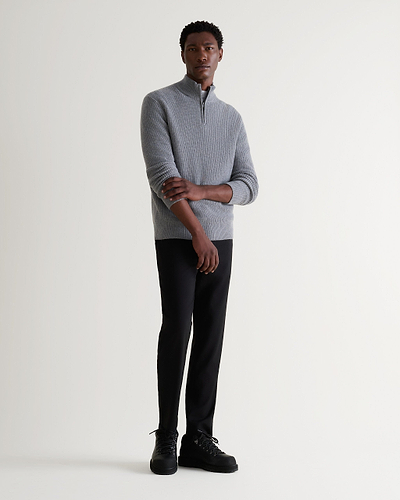 Image 1 of 6 showing man wearing Rise & Fall's Cashmere Merino Fishermans Rib 1/4 Zip Jumper in grey.