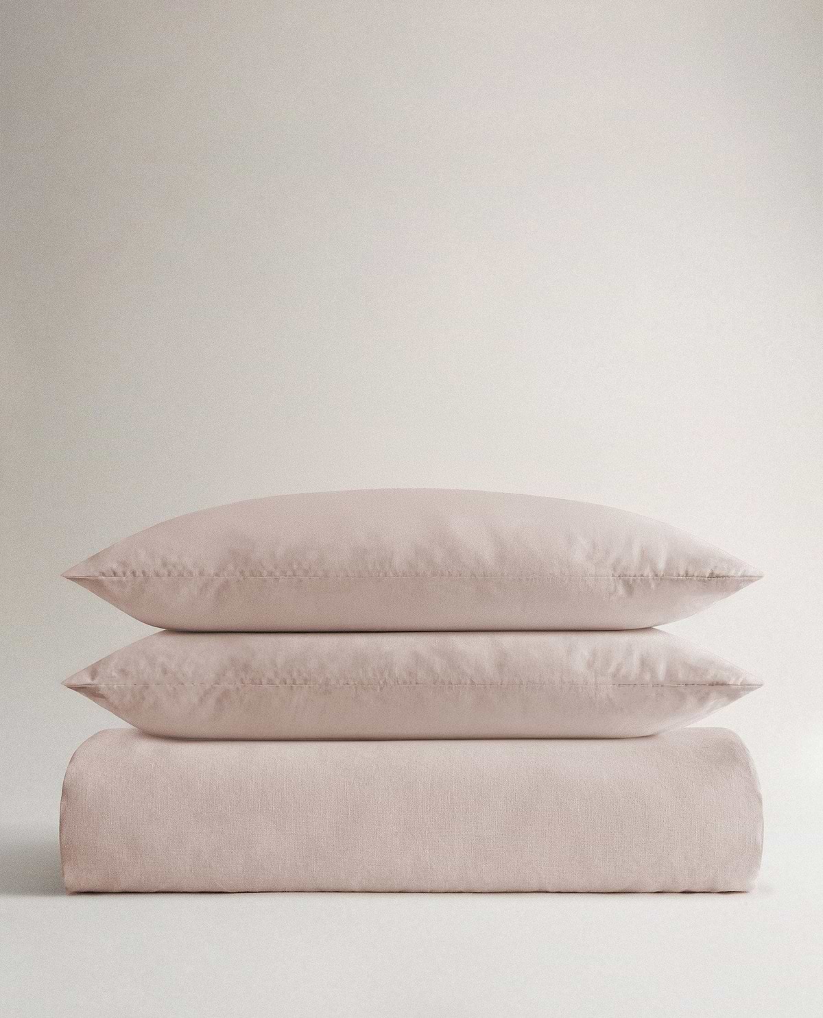 image 1 of 6 showing Rise & Fall's Relaxed & Refined linen duvet set, fabric: European flax, colour: bruised peach