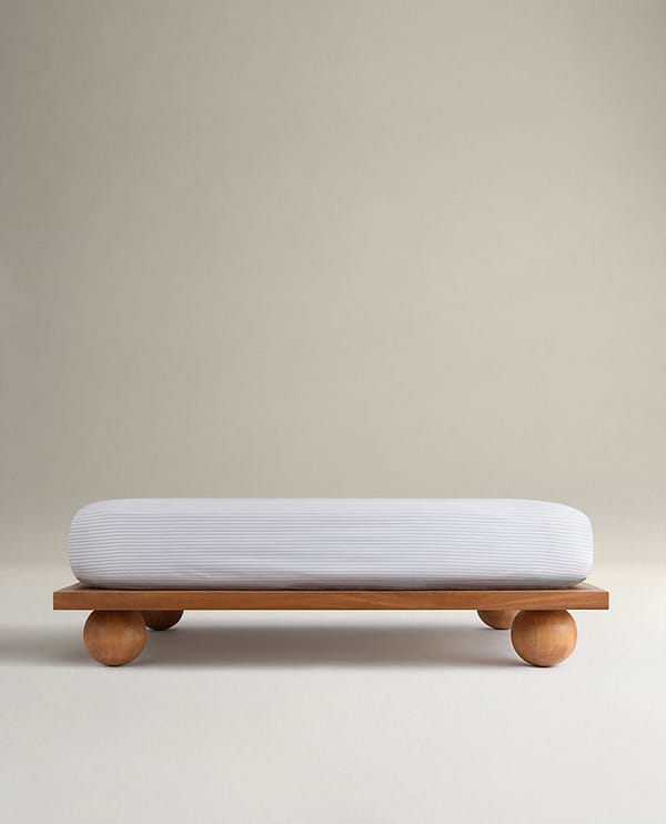 Image 1 of 6 showing Rise & Fall's Crisp & Cool organic cotton fitted sheet in blue stripe ticking.
