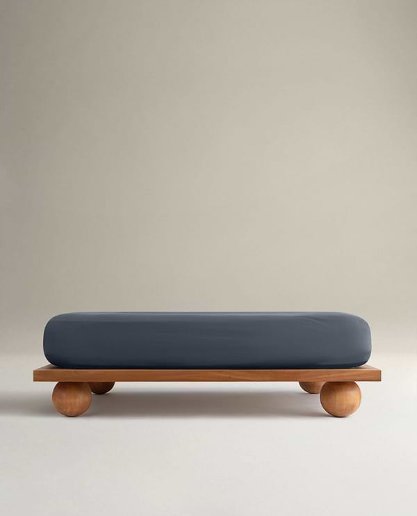 Image 1 of 6 showing Rise & Fall's Crisp & Cool organic cotton fitted sheet in indigo.
