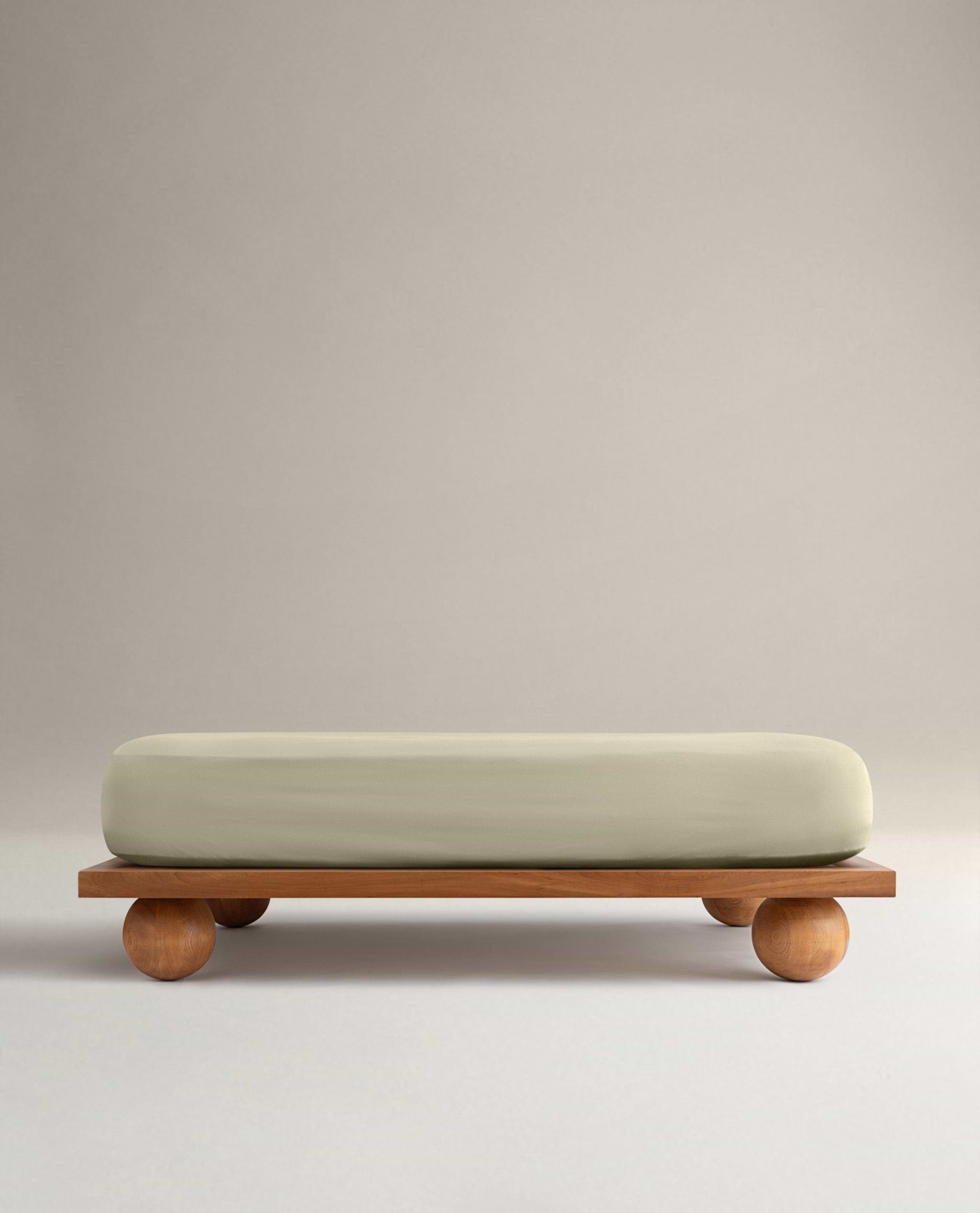 Image 1 of 6 showing Rise & Fall's Crisp & Cool organic cotton fitted bed sheet in sage.