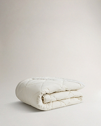 Image 2 of 2 showing Rise & Fall's  certified British Wool Mattress Topper.
