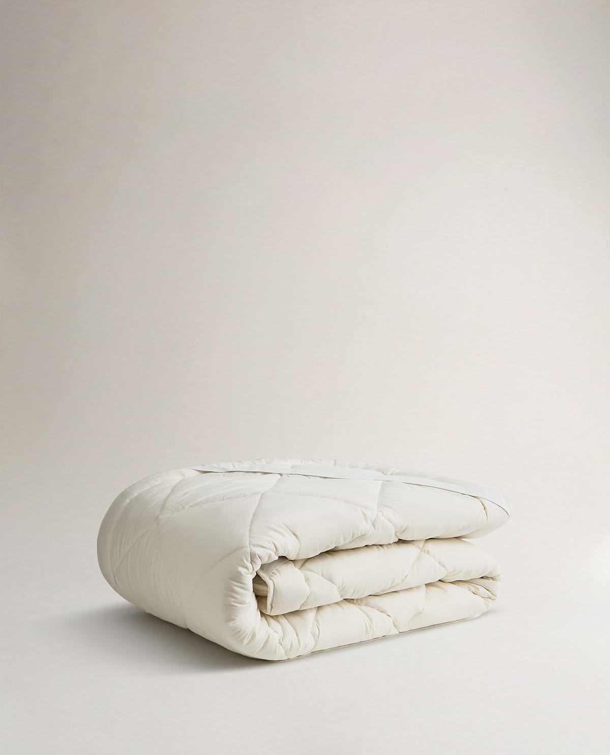 Image 2 of 2 showing Rise & Fall's certified British Wool Mattress Topper.
