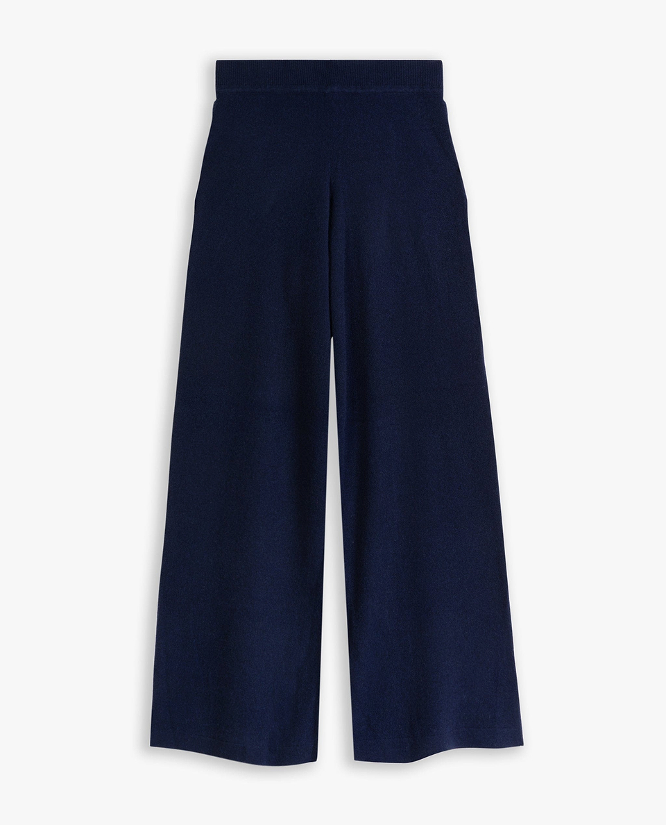 Image 2 of 3 showing Rise & Fall's navy fine cashmere wide-leg trousers.