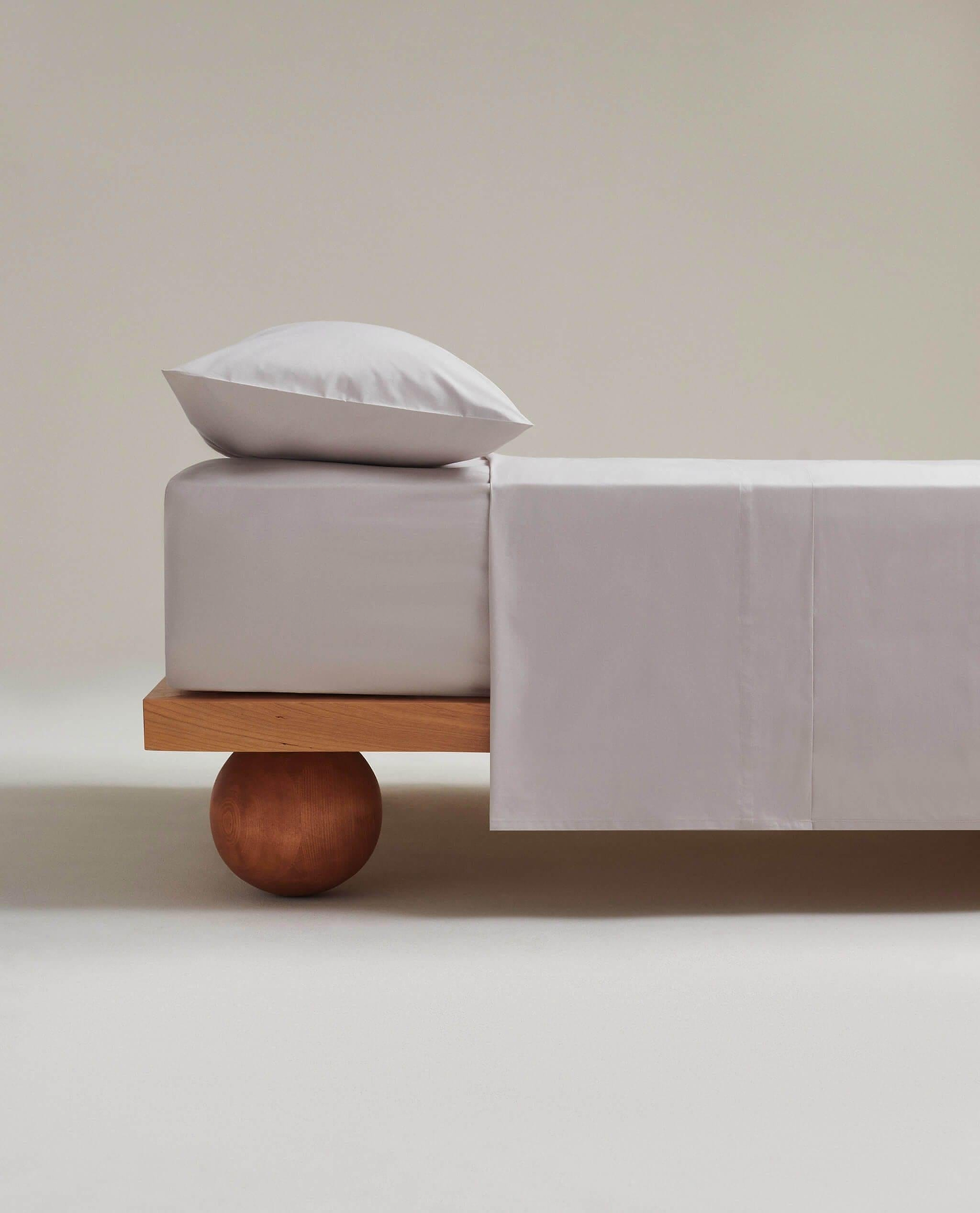 Image 2 of 4 showing Rise & Fall's Crisp & Cool organic cotton flat sheet in pebble.