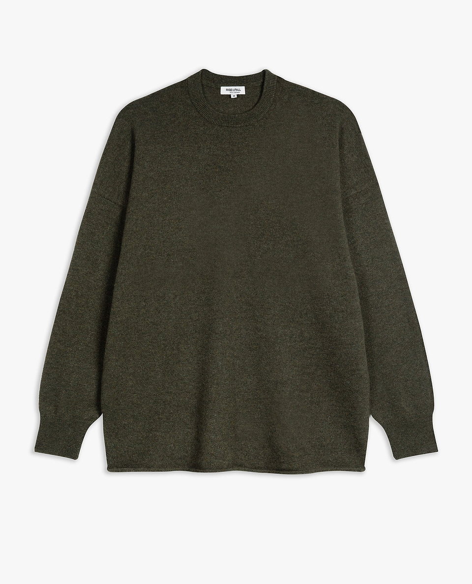 Image 2 of 5 showing Rise & Fall's finest cashmere mid-weight crew neck jumper in forest green.