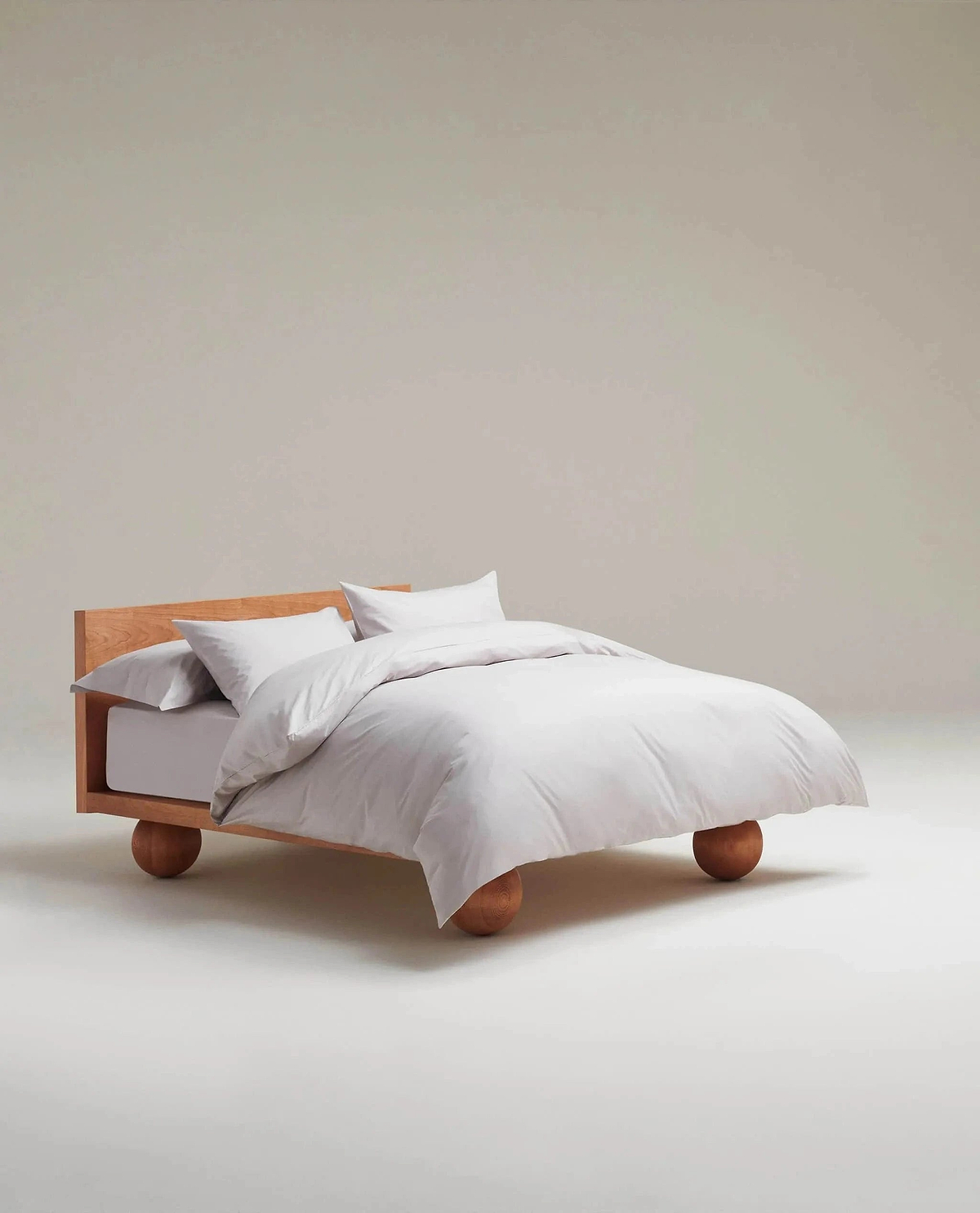 image 2 of 5 showing bed made with Rise & Fall's pebble crisp & cool duvet set in percale cotton