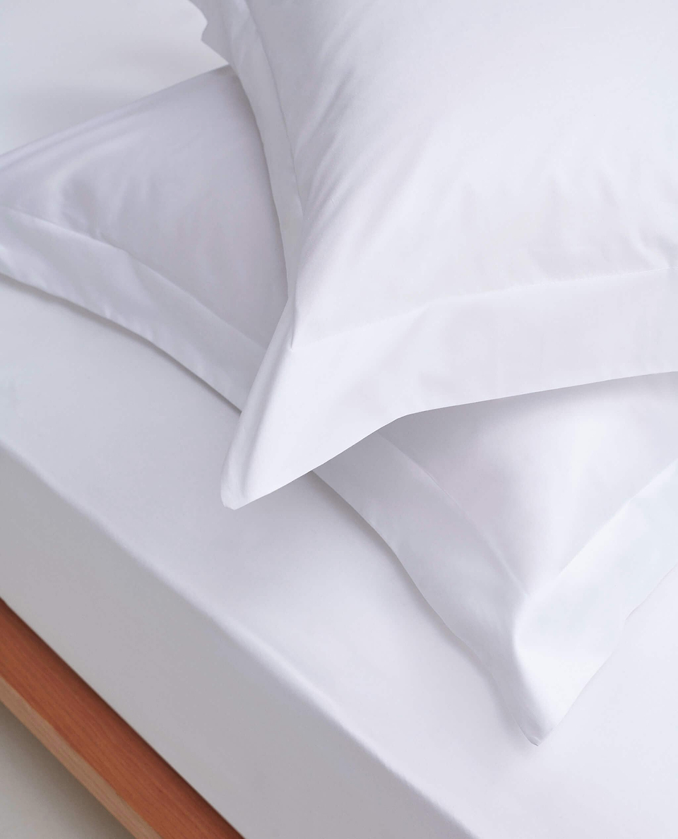 Image 2 of 5 showing Rise & Fall's Crisp & Cool Organic Cotton Oxford Pillowcase Set, colour: white.