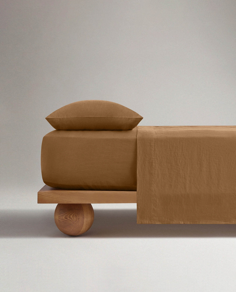 Image 2 of 5 showing Rise & Fall's Relaxed & Refined European flax™ linen fitted sheet in ochre.