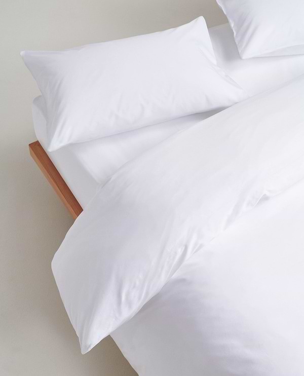 Image 2 of 5 showing Rise & Fall's Soft & Smooth Cotton Sateen Oxford Pillowcase Set in white.