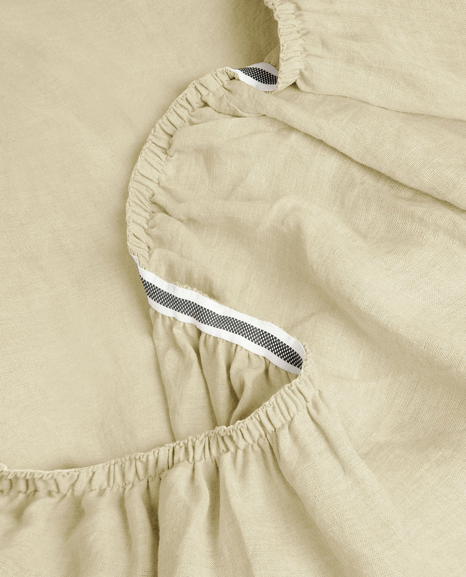 Image 2 of 6 showing Rise & Fall's House of Grey European Flax™ Linen Fitted Sheet in celery.