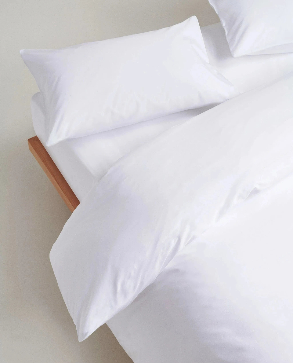 image 3 of 3 showing close up of Rise & Fall's white crisp & cool duvet set in percale cotton